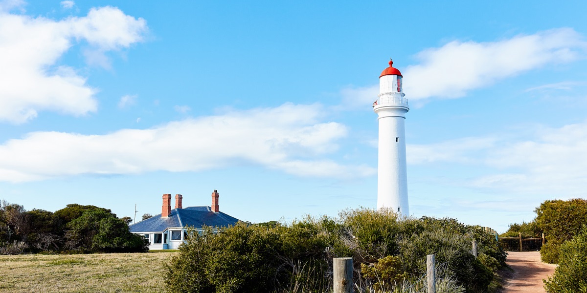 The Split Point Lighthouse in Aireys Inlet and its neighbouring cottage.